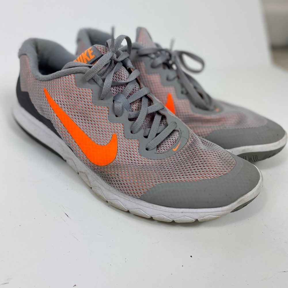Gray and neon orange Nike’s